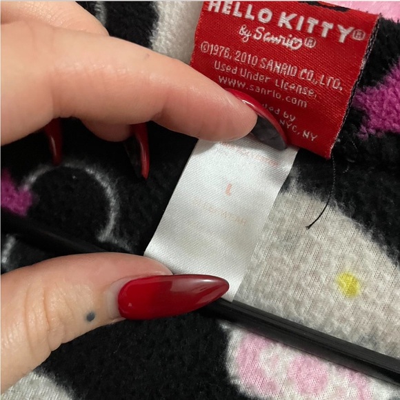 Black and pink Hello Kitty onesie - Picture 2 of 3